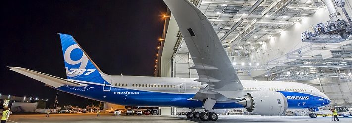 787 plane going in to a hangar