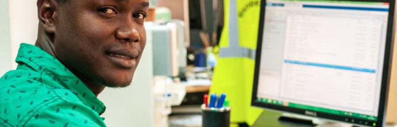 Senegalese man at computer